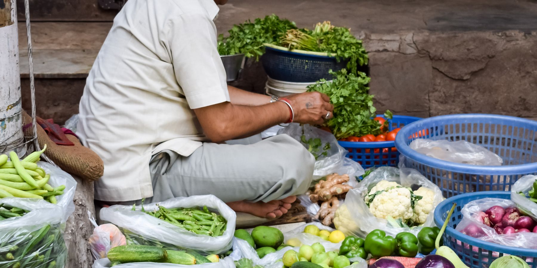 Fresh vegetables arranged at a market stall
